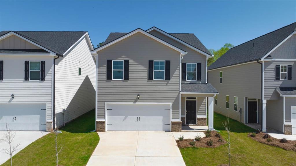 Gated Community. Prime Location near I-75, Hartsfield Airport, shopping, and dining.
Experience luxury at an affordable price with the HABOR floor plan featuring a spacious owner’s suite and two walk-in closets. Enjoy white quartz countertops, tile backsplash, stainless steel appliances, and smart home tech. Owner’s bath includes double marble vanities, separate tub & shower. Blinds included in front.
Additional bonuses bedroom on the main, loft, and open-air fitness, and trail. Don’t miss out on Tara Blvd’s best value!
***Photo shown are stocked photos, not actual home.