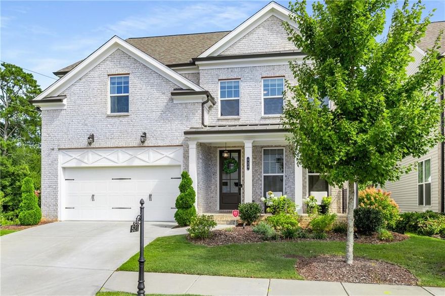 Welcome home to this stunning Craftsman-style residence with inviting front porch, blending timeless character with today’s most sought-after features. Step inside to an open floor plan where a spacious dining room with custom shiplap walls sets the tone for stylish gatherings. The chef’s kitchen impresses with quartz countertops, stainless steel appliances, farmhouse sink, gas cooktop, double ovens, and a breakfast bar. A sunny breakfast room opens seamlessly to a screened porch and deck — perfect for morning coffee or entertaining. The vaulted great room boasts exposed beams, a brick fireplace, and abundant natural light. On the main level, you’ll also find a private bedroom or flex room with a designer full bath. Upstairs, the oversized primary suite features custom his-and-her walk-in closets and a spa-inspired bath with double vanities, soaking tub, and separate shower. Two additional bedrooms share a stylish bath with dual vanities.
The finished daylight terrace level expands the living space with a large recreation room, flex/bedroom with full bath, workout room, ample storage, and walkout patio. There is a whole house water purification system and Central Vacuum system. Enjoy resort-style living in this gated neighborhood, featuring a 13-acre park with walking trails, clubhouse, swim/tennis, playground, and HOA-maintained lawns for carefree living. Ideally located in Alpharetta with Forsyth County taxes, this home offers top-rated schools; Brandywine Elementary, DeSana Middle, and Denmark High.  Easy access to shopping, dining, and entertainment.