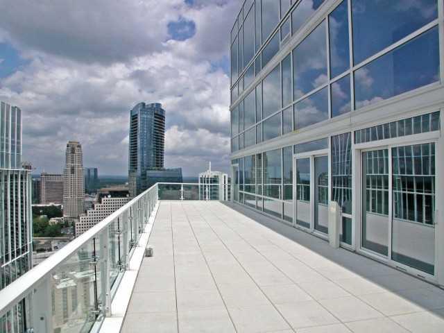 This absolutely stunning 3 bedroom penthouse in the clouds features *amazing* square footage, 3 huge balconies with breathtaking city views, and a simply gorgeous master suite with a separate attached den AND a separate breakfast kitchen! Includes THREE bedrooms and a storage unit! World-class amenities include a truly state-of-the-art fitness center with weights and cardio equipment, Yoga stretching area, massage room, amazing saltwater spa, clubroom with bar, outdoor dining areas, dog walk, and media/game room. We are now over 95% sold! MASSIVE PRICE REDUCTION!