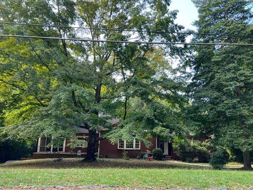 Nestled in one of North Buckhead's premier locations, 3660 N Stratford Rd NE offers a rare opportunity to own 1.2 acres of level, buildable land surrounded by mature trees and multi-million-dollar homes. Located just minutes from GA-400, 1-85, Lenox Square, and Phipps Plaza and within a highly sought-after Buckhead school district, this quiet property combines exceptional convenience with unmatched privacy in one of Atlanta's most desirable neighborhoods. Builders and developers will appreciate the redevelopment potential, as the generous lot size and R-3 zoning support a future custom luxury home site. The existing structure sits on a beautifully flat lot, ideal for new construction or an expansive estate with space for a pool, guest house, or outdoor living. Property is being sold as-is and may also be purchased together with 3604 and 3612 N Stratford Rd NE, creating a unique opportunity to own multiple homes on the same street and capture significant future upside through luxury redevelopment.