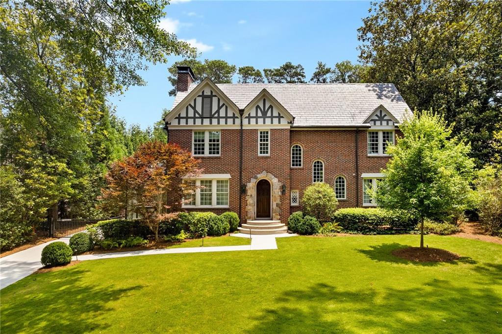 Introducing a masterfully renovated gem, nestled within the prestigious Druid Hills neighborhood. Enjoy this timeless 1925 Classic Tudor home boasting a perfect blend of historical charm and modern luxury. This meticulously restored residence offers a stunning Primary suite and bath with his and her closets overlooking an amazing private backyard. There are 4 other bedrooms and 4.5 baths in the main home and a fully equipped separate carriage house. The home boasts with elegant design and contemporary amenities. The kitchen is a dream kitchen everyone wants today. You will find yourself in a world of refined beauty, where each room tells a story of craftsmanship and attention to detail. Experience the allure of this architectural masterpiece, where history meets the comforts of modern living, creating an unparalleled living experience in the heart of Druid Hills on one of the most sought-after streets.
No stone was left unturned in the restoration of this beautiful home. The home includes an entire Control 4 System, a whole house generator, and storage galore. One not to be missed.