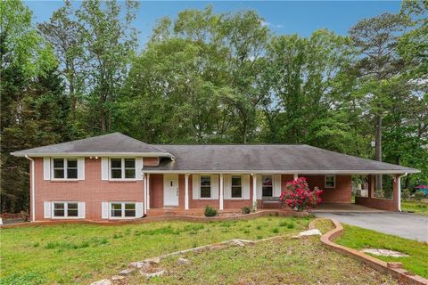 Photo of 851 Rockbridge Road SW, Lilburn, GA 30047 (MLS # 7562697)