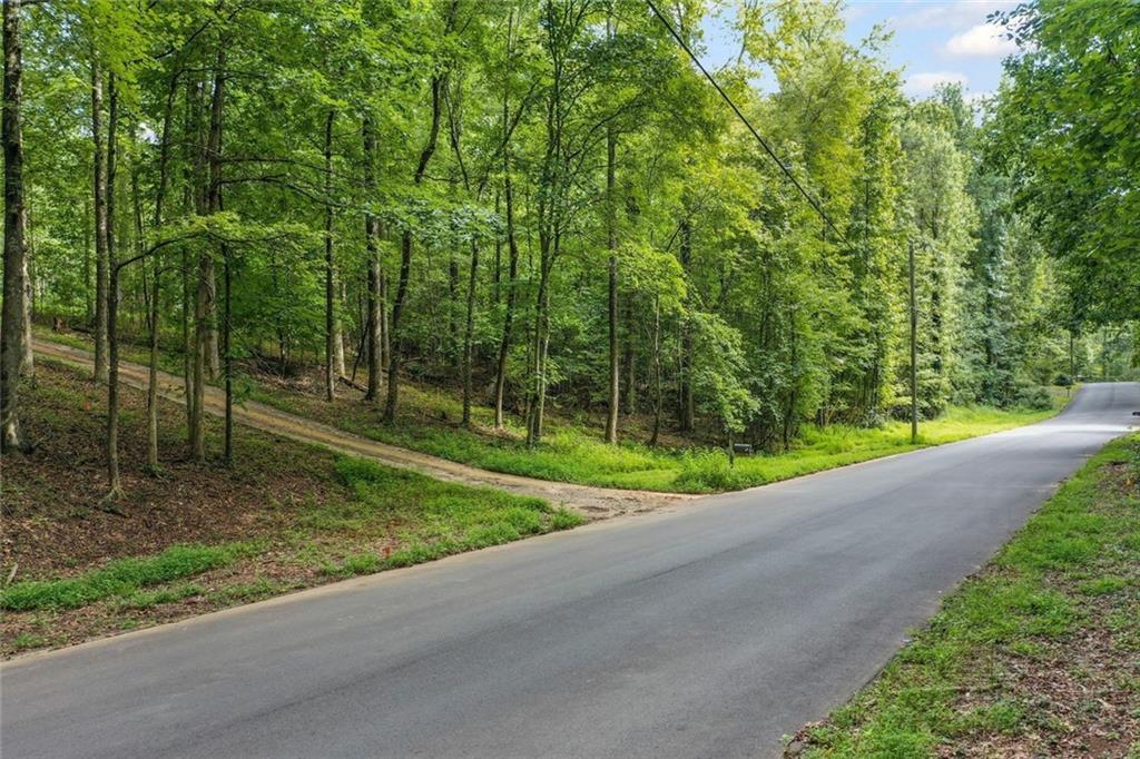 Prime Location in the Heart of Cumming! Don’t miss this rare chance to own three R-1 zoned residential lots in an established, quiet neighborhood offering privacy and convenience. Located less than a mile from the Cumming City Center, you’ll have quick access to shopping, dining, entertainment, and everything this vibrant destination has to offer—while still enjoying a peaceful setting.
The previous home has already been taken demolished and cleared, and these lots are truly ready to build, complete with topographic and soil surveys for a smooth start to construction. Whether you’re a builder planning your next project, an investor seeking a valuable opportunity, or a homeowner ready to create your dream home, this property is the perfect fit.
Private. Convenient. Build-Ready. Opportunities like this don’t come along often—schedule your showing today!