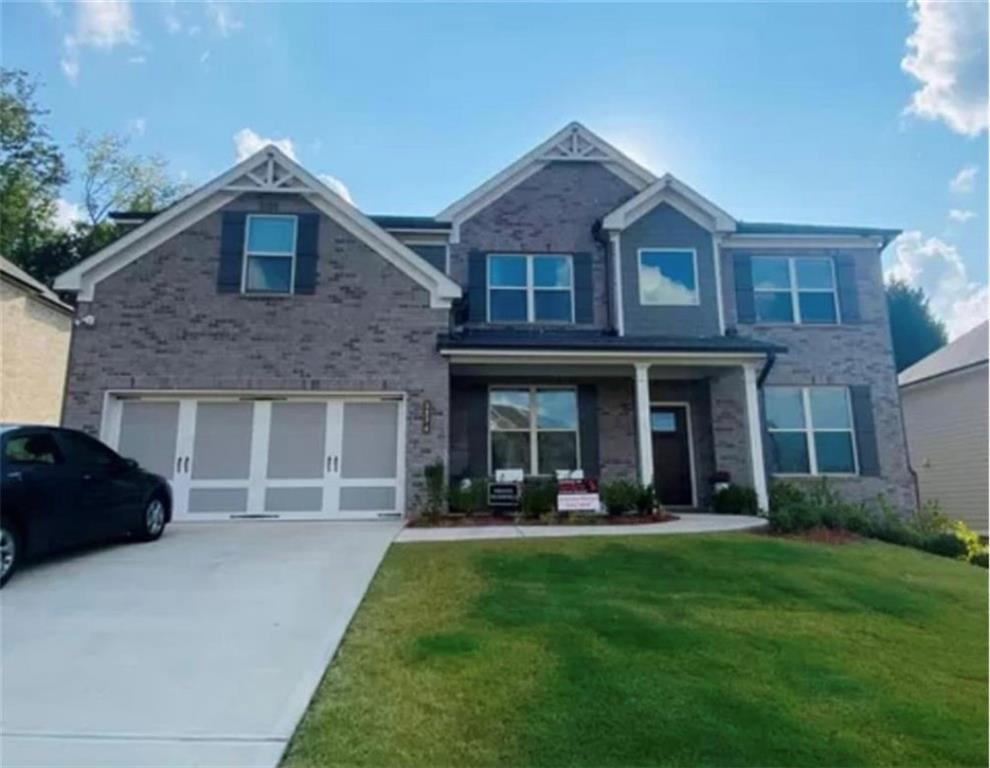 BEAUTIFUL BUILT SINGLE FAMILY HOME in highly Sought after North Gwinnett HS District. 5BR/3BA. Guest Bedroom on Main w/Full Bath. Two Story Foyer, Large Great Room with Coffered Ceilings open to Beautiful Kitchen. Kitchen offers 42" White Cabinets, Stainless Steel Appliances including Double Ovens, Gas Cooktop and Dishwasher. Herringbone Backsplash, Upgraded Lighting & Trim Package, 5" Hardwoods Floors on the Main Floor living areas. Oak Treads on Stairs including Decorative Wrought Iron Spindles. Massive Owner's Suite gives room for Sitting Area. Master Bath is an Owners Dream Tile Floors and Shower, Granite Countertops. Huge Master Closet Huge Upstairs Loft provides that Second Family Room. Two Secondary Bedrooms share a Jack & Jill Bath. Large Secondary Bedroom with private Full Bath. Oversized Screened and Covered Rear Porch overlooking Private Backyard. No Description would do this house Justice. Each applicant in the household needs to submit separate application. No smoking allowed. Pets allowed. Minimum lease 6 months, longer lease possible. PLEASE NOTE: The schools assigned to this are Riverside Elementary, North Gwinnett Middle School and North Gwinnett High School. Zillow is wrongly showing it as Lanier High.