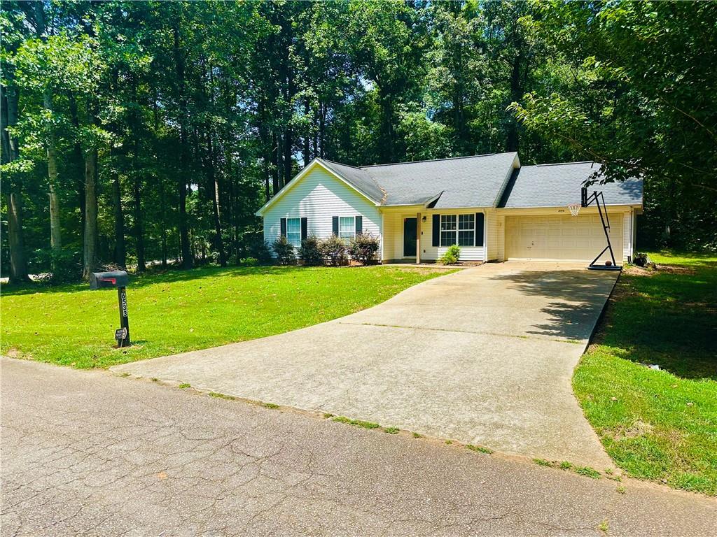 Welcome to 6533 River Hill Drive — a well-maintained 3-bedroom, 2-bathroom home tucked away on a quiet cul-de-sac in a highly convenient location just off Friendship Road. This home offers easy access to I-985, I-85, the Mall of Georgia, Lake Lanier, and top-rated schools, making it ideal for commuters, families, or investors.
Step inside to discover a light-filled living room that flows into an open eat-in kitchen, perfect for everyday living and entertaining. The primary suite features an en-suite bath, while two additional bedrooms share a full hall bath. The home also includes a spacious 2-car garage and sits on a large, flat lot with mature trees and room to expand or personalize your outdoor space.
Whether you're a first-time homebuyer, investor, or downsizer, this home offers flexibility, comfort, and long-term value with no HOA restrictions.
