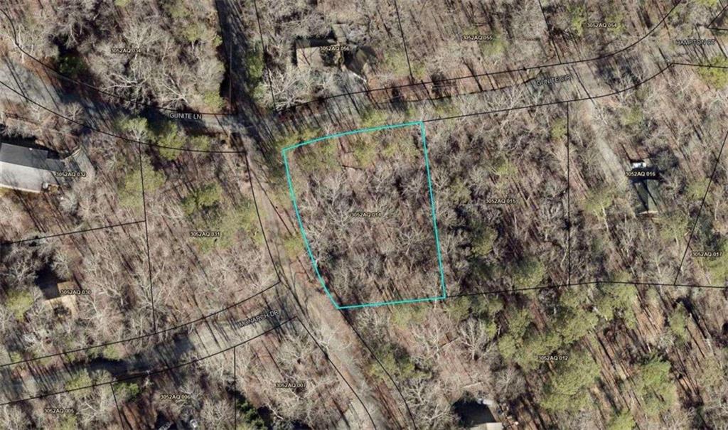 Nestled in the beautiful, forested Coosawattee River Resort, this corner lot offers access to a variety of scenic views and neighborhood amenities. Located 15 minutes from downtown Ellijay, Coosawattee River flows aside the gated entrance. A drive up the mountain leads to this picturesque lot that holds potential for a charming home.