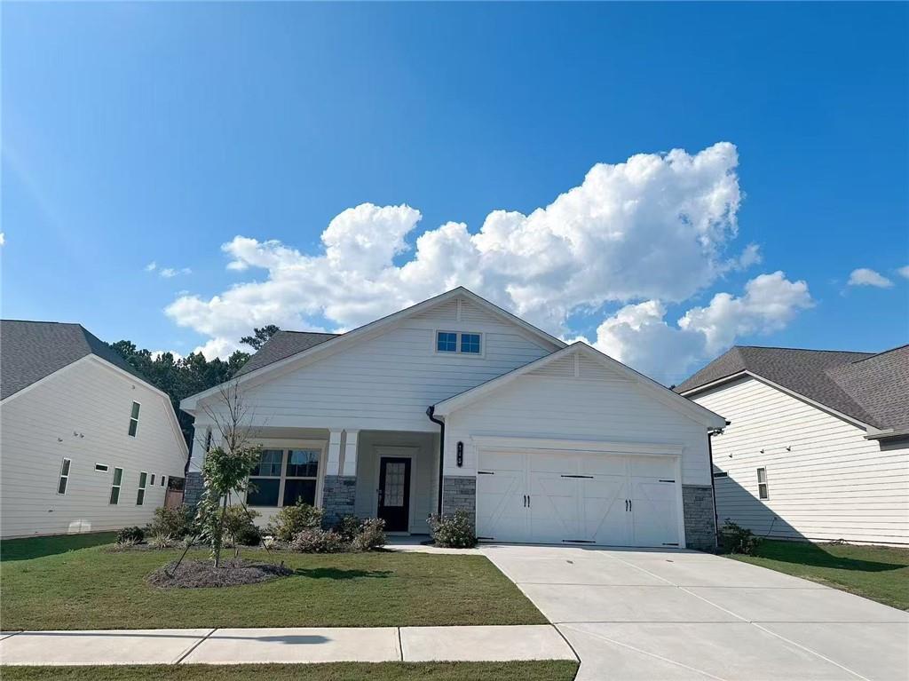 Welcome home to this stunning 3-bed, 2-bath ranch built in 2021, offering a modern open layout designed for today’s lifestyle. The spacious kitchen overlooks the living area and features a large granite island, crisp white cabinetry, stainless steel appliances, gas cooktop, and stylish tile backsplash. Enjoy casual meals in the bright breakfast nook or host formal gatherings in the separate dining room. The oversized owner’s suite provides room for a sitting area or flex space, with a spa-inspired bath that includes dual granite vanities, a walk-in shower, and direct access to the laundry room through the closet. Two additional bedrooms offer flexibility for family, guests, or a home office. Just minutes to downtown Fayetteville, major retail, and restaurants—this move-in ready home is the perfect blend of comfort and convenience.