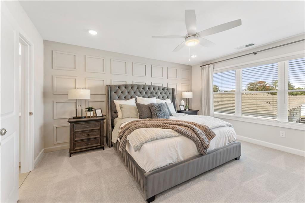 TRATON HOMES KAUFMAN "D" FLOORPLAN READY NOW!!! Traton Incentive of $10,000 any way you want it with a full price offer, plus Washer, Dryer, Refrigerator* and UP to $11,000 closing costs with a Traton approved lender. Our lenders have rates in the 5's! This beautiful three-story END unit features a rear-entry two-car garage, a large ground-floor bedroom/flex room with full bath—ideal for a peaceful workspace or accommodating guests. Hardwood stairs lead to the main level, where you'll find a spacious open-concept kitchen equipped with shaker cabinets, quartz countertops, gas cooking, a large island that comfortably seats four, and a generous pantry. The expansive family room includes a sleek, modern electric fireplace that can provide heat or simply create a cozy ambiance. You'll also find a separate dining room and a half bath on this level. The family room opens to a large, covered deck, perfect for entertaining, grilling, or watching the game in the shade. Hardwood stairs lead upstairs where you'll discover the king-sized owner's suite with an amazing CUSTOM closet! primary bathroom is complete with a double vanity and a large shower with a bench. A secondary bedroom suite on the opposite end of the upper level ensures complete privacy. Laundry is upstairs for convenience. East Park Village checks all the boxes! Its prime location is close to I-75 and downtown Kennesaw. Plus, East Park Village was voted the best neighborhood in Cobb County by Cobb Life Magazine 2024, and USA Today recognized Kennesaw as the best place to live in Georgia. Great amenities include a pool, cabana with fireplace and restrooms. Some photos are representative of this home. Call for details, we can't wait to see you! DECORATED photos are of the model. All applicants must prequalify with a Traton preferred lender regardless of who you choose for your loan.