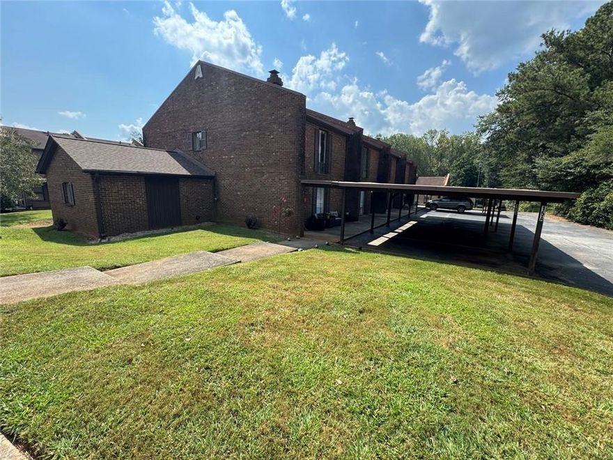 UNBELIVABLE VALUE: All brick town home, in Golf Course Community, Newly Updated, New Paint and Flooring. Easy VA Loan Financing or Cash.