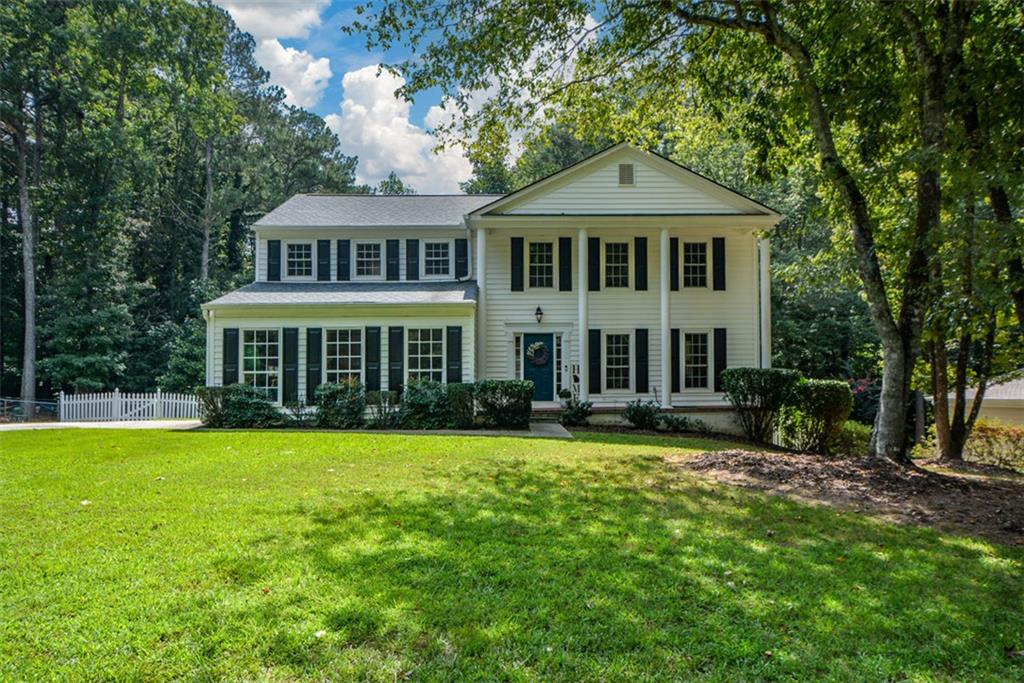 Incredible opportunity in Simpson Elementary! This is the largest floorplan in North Manor and is the only layout with the kitchen "open" to the den with fireplace. Spacious living room was used by the previous owners as a dining room. The dining room was used as a "study". You can make these spaces fit your needs! The master bedroom is enormous & has a walk-in closet. Many homeowners have expanded the master bathroom - see photos on the wall! Home upgrades include granite countertops & double-pane windows. The expansive screened porch looks out onto a very large, fenced backyard. Plus, there is an inviting deck. Level, side-entry garage. Very quiet cul-de-sac street with wonderful neighbors! Swim/Tennis is available at several clubs-all within walking distance. The YMCA, The Forum and The Peachtree Corners Town Center are all nearby. There are lots of neighborhood sidewalks and trails throughout the community.