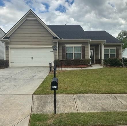 Fantastic Large Corner Lot Home in Sought After Maple Park phase of Mundy Mill subdivision! Beautiful 4 bedroom, 2 bath home with over 2100 sq ft and brand new stainless steel appliances including gas stove and side-by-side refrigerator/freezer with craft icemaker. Newly painted interior, new LVP flooring in kitchen, granite countertops, walk-in pantry and open concept into living area. Flooring also includes hardwoods, tile in bathrooms and carpet. Very spacious owner's suite in a split bedroom floorplan. Owner's en suite includes separate soaking tub and shower and private water closet as well as very large walk in closet. Exterior is brick and cement board siding for easy upkeep and a nicely landscaped front yard with privacy-fenced in backyard with an almost brand new storage building. Brand new roof and only one owner and well kept up! This one won't last long!
