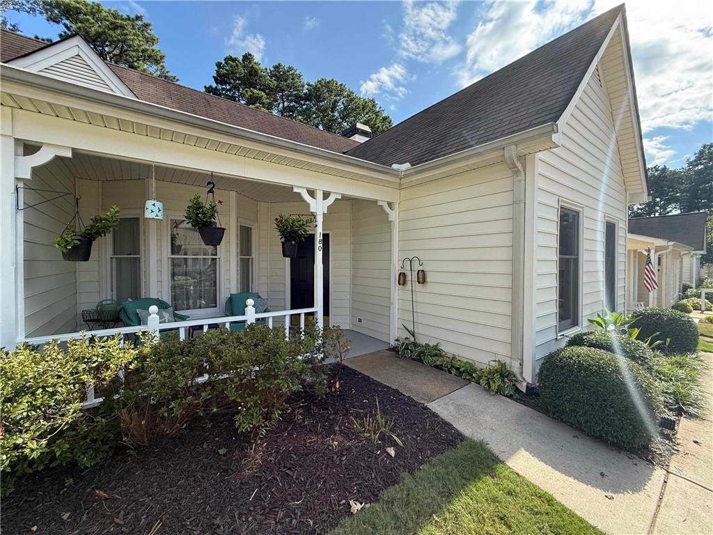 Hidden gem in Roswell, just one mile off Canton street with amazing restaurants, bars, best coffee shops in town. This amazing small community, The Cottages of Roswell is a desirable place to live, being part of a "big" family. One level home with adorable front covered porch, great to have a morning coffee or glass of wine in the evening. This 2 bedroom and a large sunroom/den/office has been totally remodeled. New white cabinets, granite countertops with breakfast bar, stainless steel appliances, gas range and modern fridge. French doors opens to a sun room that leads you to a fully fenced sunny backyard with a patio and plenty of room for flowers/vegetables. Both bedrooms are spacious and each bathroom has been fully remodeled. Master suite has a walk in closet. Close to all shopping, restaurants. Milton and Alpharetta is just a short drive. 0.5 miles is an amazing park with trails, sports courts/tennis courts and a public swimming pool. Amazing place to call home.