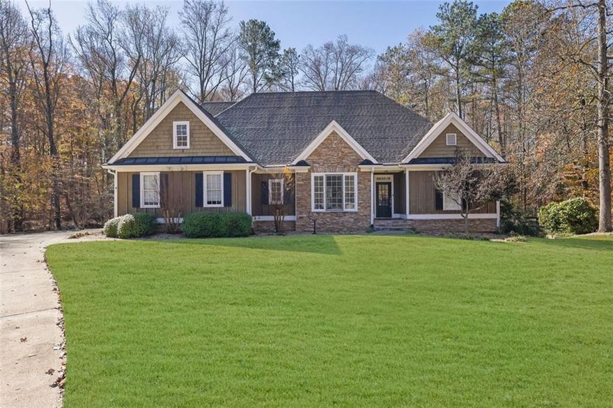 This captivating ranch-style home nestled on over 2 acres in Birmingham Manor on a peaceful and secluded cul-de-sac. The gourmet kitchen boasts ample counter space, stainless steel appliances, and a handy built in desk.  The breakfast nook overlooks the huge fenced backyard and has views of the surrounding wood. A dedicated dining room offers ample space for cherished family dinners and festive holiday celebrations. Elegant touches like wainscoting crown molding, columns, and hardwood floors elevate the ambiance, creating a space both sophisticated and inviting.
Gather in the heart of the home, the family room, featuring a majestic marble fireplace with crown molding and cathedral ceilings.  Retreat to the spacious primary suite with tray ceilings. Unwind in the spa-like master bath with tile shower, soaking tub and two separate vanities. Generously-sized secondary bedrooms and bathroom offer comfortable accommodations for family or welcomed guests.  Recent upgrades include an oversized HVAC system and a newer hot water heater. LED lighting throughout enhances energy efficiency. A huge deck overlooks the expansive fenced backyard, bordered by a tranquil creek and a natural setting of woods and offers privacy and serenity.