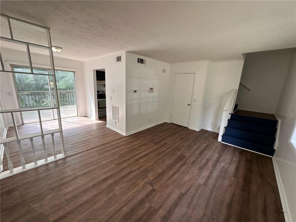 This fully renovated 3-bedroom, 2-bath home offers a rare combination of space, flexibility, and modern finishes across three levels. Technically a townhouse, this end-unit home is only attached by one wall offering the privacy and feel of a single-family home with the low-maintenance convenience of attached living.
Inside, you'll find fresh paint, brand-new luxury vinyl plank flooring throughout, and a clean, modern layout that works for a variety of living arrangements. The upper level includes two spacious bedrooms, a full bathroom, and a bright main kitchen with a brand-new refrigerator and plenty of cabinet storage. A private balcony adds outdoor living space just off the main floor.
The lower level features a separate studio-style suite with its own full bathroom, kitchenette, and private entrance ideal for a guest suite, home office, or bonus living space. Newly built interior stairs connect the levels, while still allowing privacy and flexibility. Step outside to enjoy a rear deck and a natural, peaceful setting with ample off-street parking.
With two kitchens, three stories, and a smart layout that supports work, life, and guests under one roof, this home stands out from standard rentals.
We take pride in offering well-maintained homes and work with tenants who value clean, comfortable living. All applicants are screened with credit, background, income, and rental history checks. Verifiable income of at least 2.5x monthly rent is required, along with no prior evictions or bankruptcies. A security deposit equal to one month's rent is due at signing.