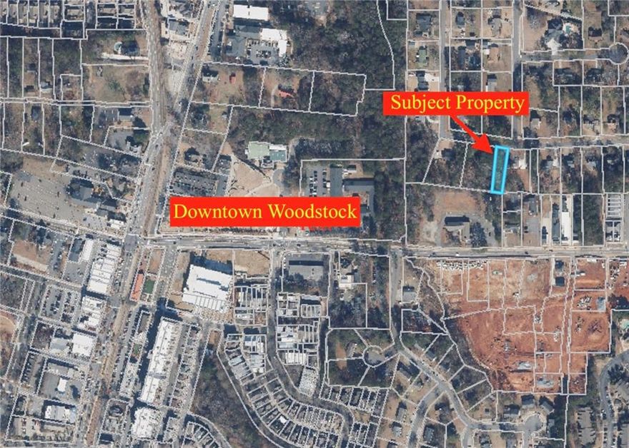 If you are looking for an infill building lot in downtown Wodostock don't miss this rare opportunity.  This lot lays well for an easy basement home with gravity public sewer available.  Tucked back on a quiet and peaceful street, yet you are in the heart of downtown Woodstock with shopping, restaurants, and vibrant nightlife.  63' wide lot x approximately 205', gently sloped, sewer on site at low point of the property.  Ready to build your dream Downtown Woodstock home!