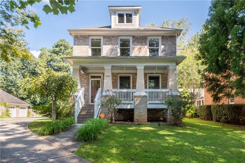 Beautifully maintained 3 Bed/2.5 Bath in an unbeatable East Atlanta location - around the corner from East Atlanta Village and minutes from the Beltline, you will truly be immersed in the best parts of Atlanta culture. Tucked off the neighborhood street, the oversized covered front porch greets you into the main floor with gorgeous hardwood floors where you'll find a 12+Seat Dining Room, Brand New Wet Bar, Updated Half Bath, and an Open-Concept Kitchen that overlooks the living room and breakfast area. Upstairs you will find the Primary Suite that consists of a completely remodeled bathroom - double vanity, tiled shower with a frameless door, large walk-in closet, and a separate tub. In addition, the upstairs also has 2 generously sized guest bedrooms, full bath, laundry, and a bonus loft area that can be used as an office/yoga/flex space. The back yard speaks for itself - an ENORMOUS deck, detached garage, and a perfectly flat fenced in backyard makes this home perfect for entertaining or playing with the kids. Entire interior has been freshly painted and updated - ready for new tenants!