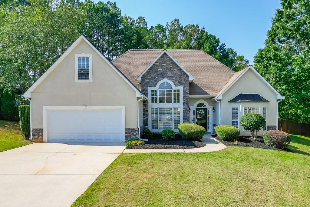 Welcome to this beautifully maintained ranch-style home, complete with a spacious bonus room above the garage and a finished sunroom at the rear. Situated on a .50+ acre lot, the home is perfectly positioned on a quiet cul-de-sac, featuring an extra-long driveway, a fenced backyard, and a party deck with a charming pergola.
Inside, the main level boasts an open-concept design with a family room and cozy fireplace, a dining room with soaring 12+ foot vaulted ceilings, and a large welcoming foyer. The kitchen is well-appointed with newer appliances, granite countertops, a tile backsplash, and a built-in dry bar – perfect for entertaining.
The expansive owner’s suite includes a spacious sitting area filled with natural light. The ensuite bath offers framed mirrors, granite countertops, a walk-in shower, a relaxing garden tub, and a generous walk-in closet.
Secondary bedrooms are roomy and share a nicely appointed guest bath. Upstairs, the bonus room provides additional space for a media room, playroom, or home office – offering flexibility to suit your needs.
Located in a desirable community with resort-style amenities, you’ll enjoy a neighborhood pool, sidewalks for leisurely strolls, street lights for added charm and safety, and tennis courts for recreation.