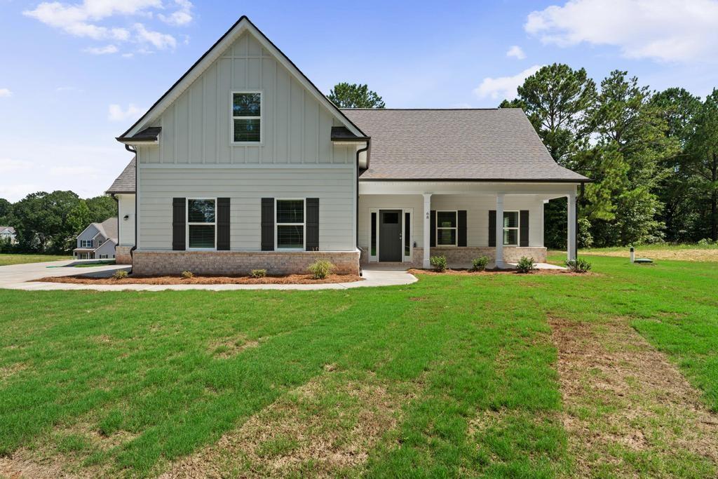 This beautiful new home offers an open floor plan with the master bedroom on the main level. Upstairs features three additional bedrooms and a spacious bonus room. Enjoy outdoor living with a rocking chair front porch and a large covered back patio. A 3-car garage completes this stunning home in a desirable location.