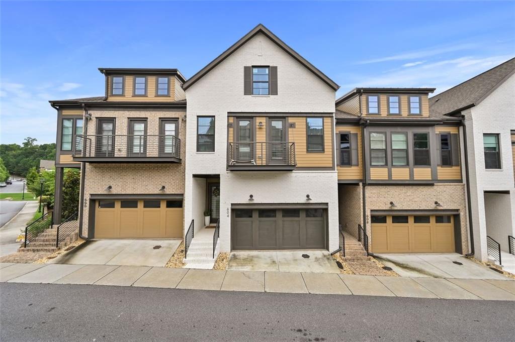 ***Better Than New! Luxury Townhome in Gated Alpharetta Community*** Welcome to 604 Landler Terrace, a better-than-new luxury townhome located in one of Alpharetta’s most sought-after gated communities. This stunning two-story residence with a fully finished basement has been thoughtfully upgraded with modern, high-end finishes throughout, offering both style and sophistication in every detail. Step inside to discover open-concept living spaces filled with natural light, custom designer touches, and premium materials. The chef’s kitchen boasts sleek cabinetry, quartz countertops, and top-of-the-line stainless steel appliances — perfect for entertaining or everyday living. The finished basement provides a versatile retreat, ideal for a home theater, gym, office, or guest suite. Upstairs, spacious bedrooms and spa-like bathrooms create a private sanctuary, while the main living area opens to a beautiful view and well-maintained outdoor space. Enjoy resort-style living with access to community amenities including a sparkling pool, lush common areas, and secure gated entry. This home combines low-maintenance living with upscale comfort — all just minutes from downtown Alpharetta, Avalon, and top-rated schools. Don't miss the opportunity to own this move-in-ready gem in a prime location — a true luxury lifestyle upgrade.