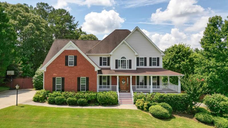 CAR LOVERS, HOBBYIST and RV OWNERS—this is the home you’ve been waiting for! With two separate 2-car garages, an extra driveway, and a drive-under garage perfect for your big boy toys, classic cars, or RV, this property offers unmatched flexibility and storage for all your vehicles and gear. Whether you're a collector, a craftsman, or just need extra space, this setup is a rare find.
Set on a desirable corner lot in a well-maintained neighborhood, this home combines thoughtful design with standout features throughout. Step into a soaring two-story foyer with double coat closets, and enjoy the warmth of updated hardwood floors on the main level, complemented by fresh light fixtures and a spacious layout.
The kitchen is a chef’s delight, featuring granite countertops, stainless steel appliances, a stylish backsplash, and an extra-long pantry. Enjoy meals or quiet evenings on the screened-in back porch with an adjoining deck, all overlooking your private, fenced backyard oasis complete with a sparkling inground saltwater pool.
Upstairs offers plush carpeting and generously sized rooms, while the main-level laundry room adds everyday convenience. Major updates are already taken care of, including a 5-year-old roof, HVAC, and water heater.
The unfinished basement offers endless potential—transform it into the ultimate game room, recreation space, or expanded workshop. This home has it all: space, style, and versatility in a location you'll love.