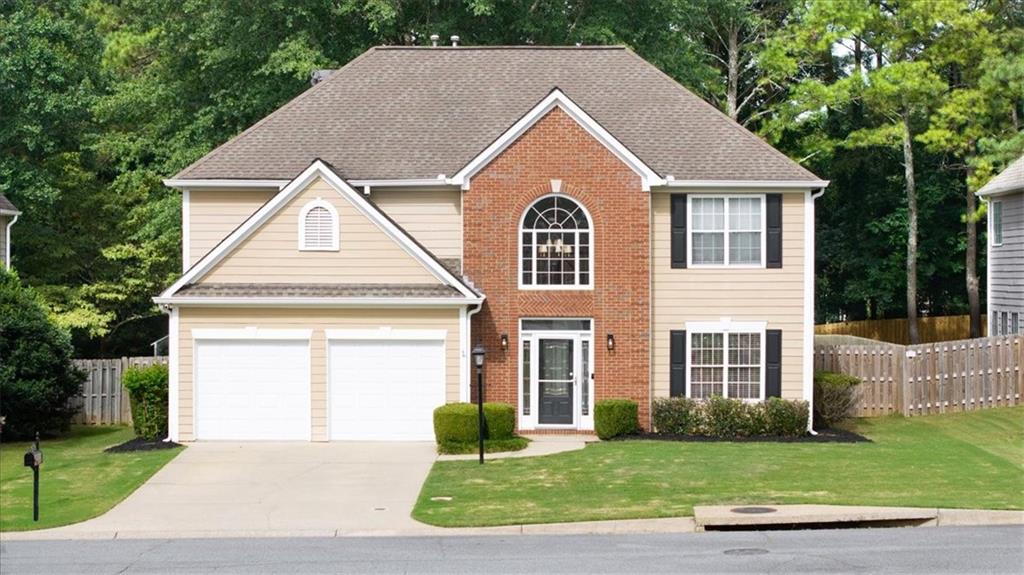 Nestled in the highly desirable East Worthington swim/tennis community in East Cobb. Located just minutes from I-75, this home offers effortless access to Marietta Square, The Battery, and Downtown Atlanta, while still enjoying the comfort and quiet of a well-maintained neighborhood. With sidewalks, streetlights, a large community pool, lighted tennis and pickleball courts, and a playground, this community is ideal for those seeking both convenience and connection.
Inside, this freshly painted 4-bedroom, 2.5-bath home offers a functional and flexible layout. The two-story foyer welcomes you into a bright and open main level featuring a separate living room and formal dining room - perfect for entertaining. The kitchen boasts beautifully stained cabinetry, granite countertops, stainless steel appliances, recessed lighting, and a breakfast area that opens into the cozy family room with built-in shelving and a fireplace. Upstairs, the expansive primary suite includes a tray ceiling, large walk-in closet, and a spacious en-suite bath with vaulted ceilings, a soaking tub, double vanities, and a separate shower. Three additional generously sized bedrooms, all with hardwood flooring, a full bath, and a spacious laundry room with storage complete the upper level. Step outside to discover one of this home’s true highlights - a sprawling, fully fenced backyard offering privacy, space, and endless potential. Whether you're hosting summer cookouts on the oversized deck, creating a play space, planting a garden, or even adding a future pool, this yard is your blank canvas. With fresh updates throughout, community amenities just steps away, and walkable access to everyday essentials like Publix, this home delivers East Cobb convenience without compromising on charm or space!