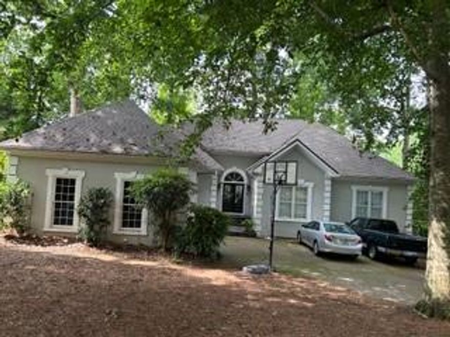 Located in the sought-after school districts of Crabapple Crossing Elementary, Northwestern Middle, and Milton High School, this home checks every box for location and potential. With 5 large bedrooms, and 3.5 baths, this home offers incredible space and versatility. The open layout, high ceilings, and new flooring throughout the main level creates an inviting atmosphere, perfect for everyday living or entertaining.Laundry room off the kitchen for convenience  This spacious ranch-style home is being sold as is, providing a unique opportunity to own a well-loved home in one of Alpharetta's most desirable and walkable neighborhoods - just a short walk away from Crabapple Market! Enjoy:
A new roof (2024), Newer gas water heater, A finished basement for added living space,Gas fireplace for cozy nights. Plantation shutters and oversized windows that flood the home with natural light. Also, there is a large outdoor deck great for entertaining