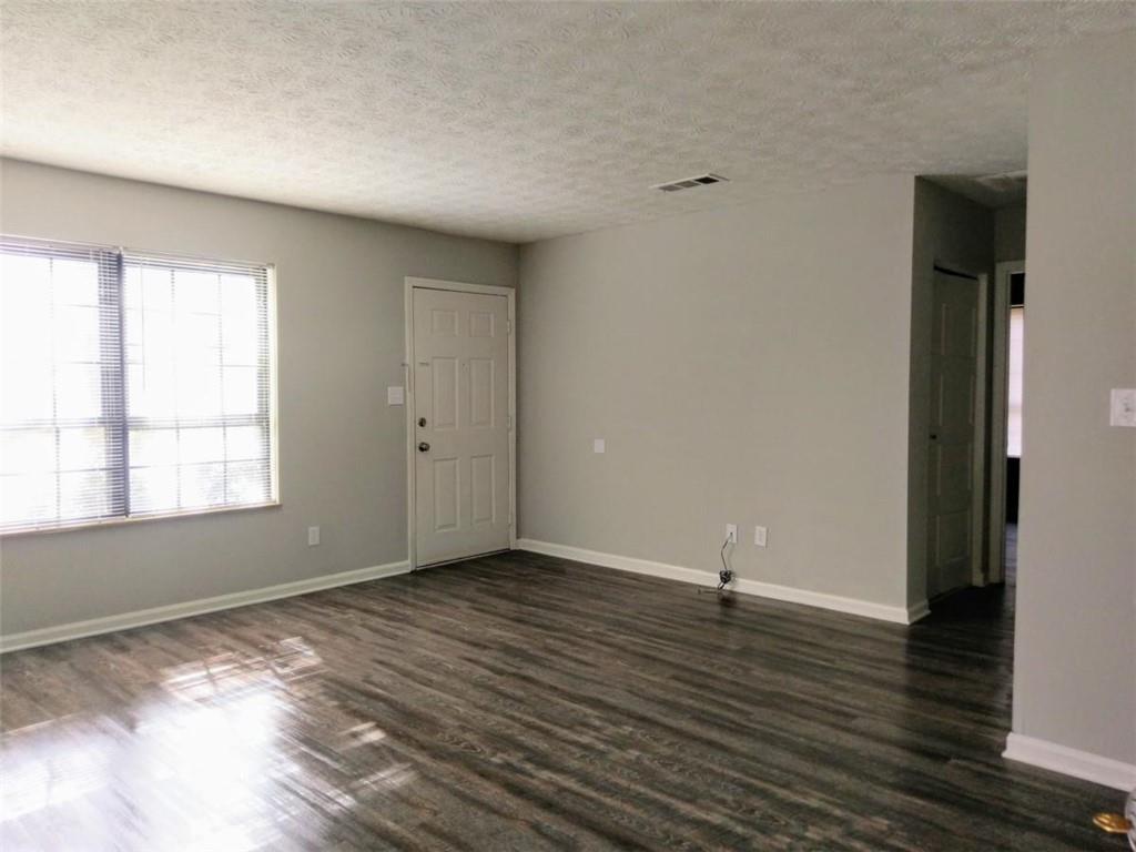 This end unit two bedroom home is ready to move into for the new family starting out, one looking to maximize savings for such a low cost home, or the family downsizing. The end unit has a fenced area for privacy. Owner/agent will consider owner financing. Owner financing will require 10% to 20% down payment. Call for details if interested in owner financing.