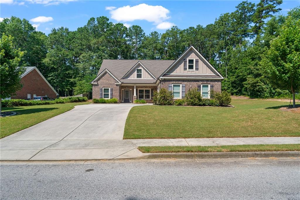 Like-New Beauty in Prime Loganville Location! Welcome to an impeccably maintained builder’s model home, lovingly maintained by one owner. From the moment you step inside, you'll see and feel the difference—this home truly lives like new! Nestled in a private, sought-after community with a sparkling swimming pool, you’ll enjoy this beautifully designed home and love the neighborhood lifestyle.
Thoughtfully built with upgraded finishes, spacious living areas, and a smart, open layout, this home offers both comfort and style. The heart of the home - the kitchen - is a chef’s dream, with a farmhouse-style sink, recessed lighting, ample storage, and pristine work spaces. A clear view to the living room with bar seating offers easy entertaining for hosting your next gathering.
An oversized owner’s suite on the main level provides easy, accessible living. Both main level bedrooms enjoy ample closet space and a thoughtfully designed, full bathroom. Upstairs, an oversized bedroom or flex room boasts a full bathroom and generous closet space, ready to be used for any purpose.
The beautiful 4-sided brick exterior is matched by an inviting interior, perfect for entertaining or relaxing in your own private space. Underground irrigation keeps your lawn green and healthy. Garden, set up a playset, or simply sit on your private back patio and enjoy the peace & quiet.
Located in one of Loganville's most desirable areas, you're just minutes from top-rated schools, grocery stores, shopping, and dining — everything you need is right at your fingertips. Publix, Walmart, Home Depot, and Lowe’s are all within 3 miles from home. This home truly checks all the boxes.
Don't miss your chance to own a like-new home in a thriving community with unbeatable convenience and charm. Schedule your private showing today!