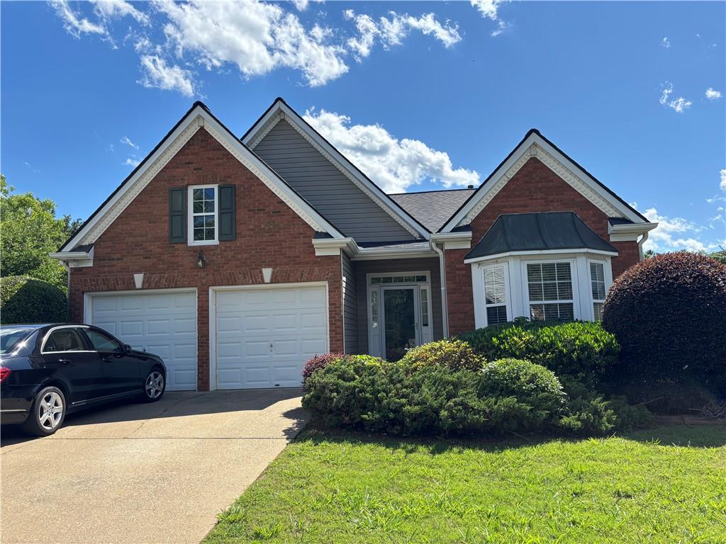 Perfect rental opportunity. Great location right off Hwy 92 close to shopping and restaurants. Located in a cul-de-sac this Brick and vinyl ranch home is easy to maintain. Hardwoods and carpeted bedrooms. 2 Car Garage and Private Fenced Backyard. Family Room with fireplace and kitchen with black appliances with refrigerator already in place. This one is ready for immediate occupancy. No Pets.