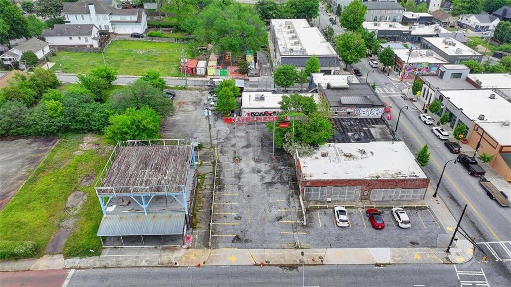 Discover four contiguous lots available for a combined sale, at the corner of Fraser Street SE and Georgia Avenue SE, situated in the middle of historic Summerhill, primed for commercial mixed use opportunities. Envision possibilities of offices, retail stores or even a bustling hotel. * Optimally positioned in a heavy foot and vehicle traffic area, ensuring maximum visibility and accessibility. * Easy 1+/- block walk to Georgia State University's Center Park Stadium and future Georgia State University's Baseball Stadium complex. * Short driving distance to MARTA transit stations, Interstate I-75/I-85 access and Georgia State Capitol. * Ideal commercial property connecting to 3 streets: Fraser Street SE, Georgia Avenue SE and Reed Street SE. * Close proximity to Chase Bank, Publix, Phoenix Parks and various eateries. * Atlanta City School District, Georgia State University, Georgia Institute of Technology Multiple parcels in assemblage totaling 21,545 land square feet: 634 Fraser Street SE: Land Sq Ft: 10,019 /.23 Acres. 1,476 Sq Ft building and 1,600 Sq Ft upper wood deck. MRC-1-C; 640 Fraser Street SE: Land Sq Ft: 3,744 / .086 Acres. MRC-3-C; 646 Fraser Street SE: Land Sq Ft:5,390 /.1237 acres. 1,420 Sq Ft building. MRC-3-C; 56 Georgia Ave Rear SE: Land Sq Ft: 2,392 /.0549 Acres. MRC-3-C This is a great opportunity for the right buyer to add value to the remarkable Summerhill vicinity.
