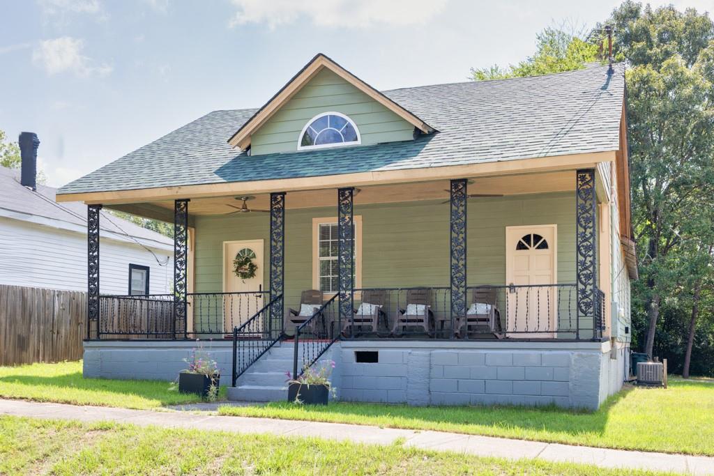 Charming historic bungalow located just a short walk from downtown Porterdale. This 2-bedroom, 2-bath home is currently operating as an Airbnb and can be sold fully furnished, offering a great investment opportunity. Features include a brand-new water heater and a functional layout with room for updates. Enjoy all that this growing area has to offer, including new restaurants, parks, and the scenic Yellow River just steps away.
