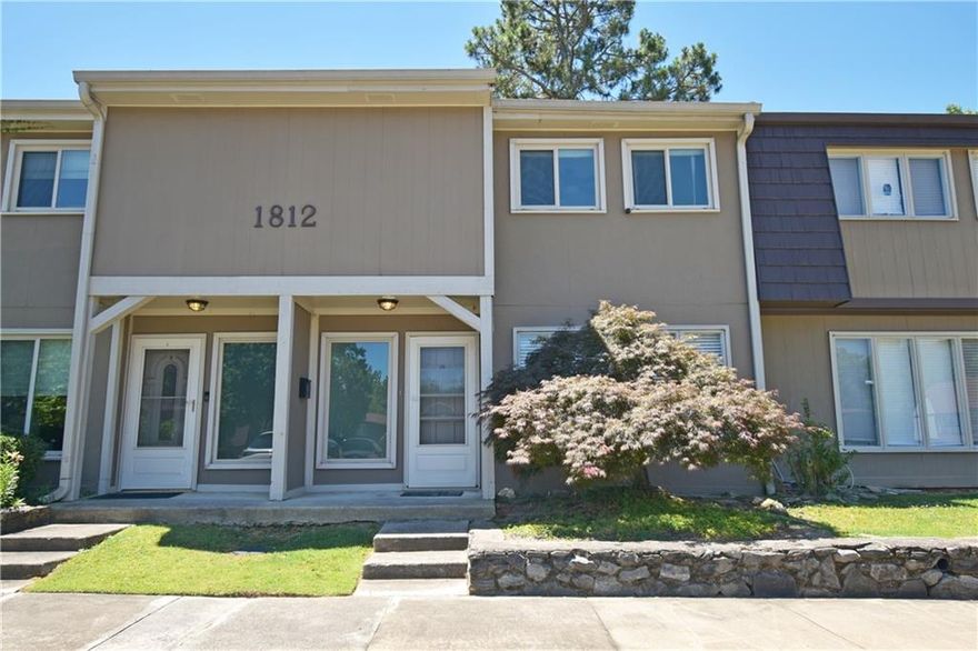A very nice 3 beds, 1.5 baths, 2-story home with two assigned parking spaces, located in a Swim/Tennis community, nestled in charming Marietta GA. The 1st floor features a modern kitchen with granite countertops, stainless steel appliances, half bath, and laundry. The living room and a part of the family room can be used as two extra bedrooms. Spacious master and another two secondary bedrooms with a full bathroom upstairs. Newer painting and newer flooring throughout the entire unit.  The fenced backyard is perfect for the family to sit and relax. HOA covers natural gas besides water. Conveniently located within minutes to everything, including parks, sports, restaurants, Life University, Kennesaw State University, Cumberland Mall for shopping, I-75, etc.