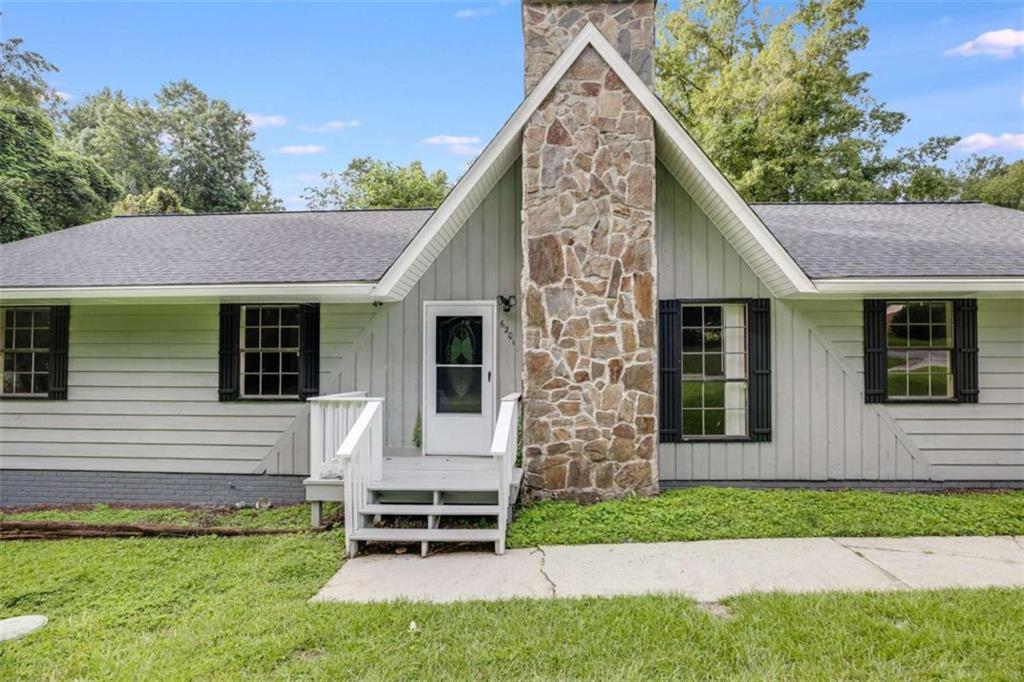 Zoned for Alexander High School! Nestled on 1.2 serene acres with Bear Creek flowing through the property, this charming 3 bed 2 bath home offers the perfect blend of comfort and nature. Step inside to find new flooring, lighting and fresh paint. The kitchen shines with stainless steel appliances and granite countertops. Outside, enjoy a large double lot. The flat backyard is perfect for gardening, play or quiet evenings by the creek! Call your favorite agent for your tour today!