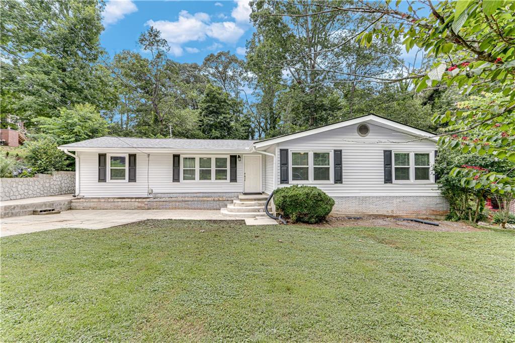 Charming ranch with Timeless Roots & Modern Updates! Offered for the first time since the 1960s, this well-loved 4 bedroom, 2 bathroom ranch is full of warmth, character, and thoughtful updates. The kitchen has been beautifully renovated in recent years—blending classic charm with today’s functionality. You’ll also find a sunroom that invites natural light all year long and a bonus office space that’s perfect for working from home or managing the day-to-day. Sitting on a level lot with a fenced backyard, this home is ideal for pets, play, or peaceful evenings under the stars. Located close to schools, shopping, restaurants, and Northeast Georgia Medical Center, it's convenience and comfort wrapped into one easy-living package. Don't miss your chance this own one - its been lovingly cared for and is ready for its next chapter.