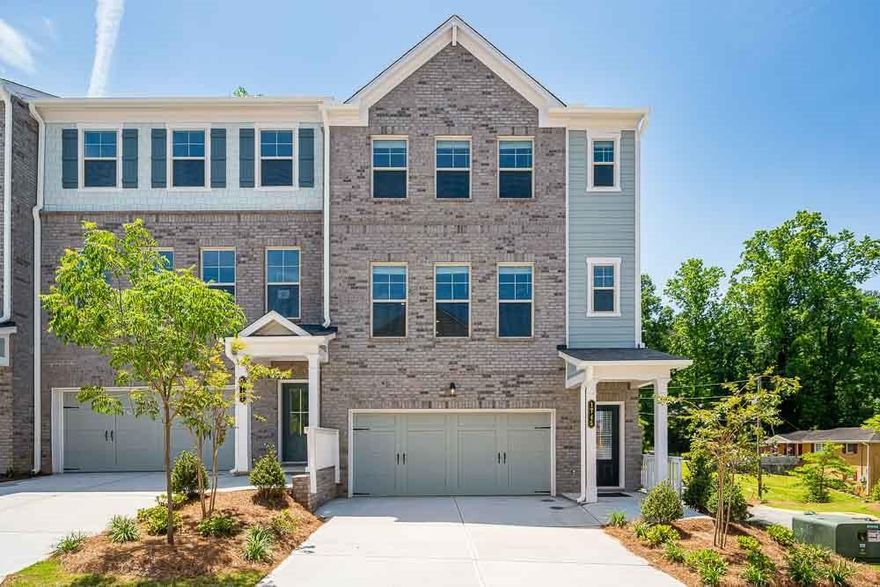 MLS#7537116 New Construction - Ready Now! Welcome to the Reynolds at 1745 Lansmere Street SW in Hampton Trace, a thoughtfully designed new townhome at Hampton Trace with a spacious, open layout that fits a variety of lifestyles. The lower level features a versatile secondary bedroom with an ensuite bathroom and backyard access—perfect for guests or a private retreat. On the main floor, the modern kitchen flows effortlessly into the dining area and gathering room, complete with a convenient half bath. Step onto the deck and start your day with fresh air and coffee in hand. Upstairs, the primary suite boasts a generous closet and spa-like bathroom, joined by two additional bedrooms, a shared full bath, and a laundry room. With its smart design and everyday comfort, the Reynolds is a home that truly works for you. Additional highlights include: electric fireplace in the great room, modern handrails, and laminate stair treads.