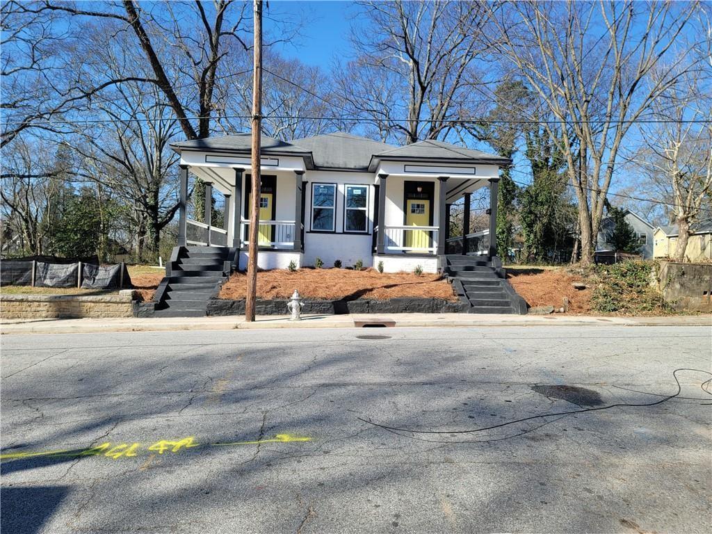 Welcome home! This classic renovation, located in Historic Vine City is on a great street a stone's throw away from the Belt-Line! You will love the Covered rocking chair front porch and being minutes from Mercedes Benz Stadium, Georgia Aquarium, and Grove Park. This home features gorgeous flooring, updated bathrooms recessed lighting, modernized kitchen, Brand-new electricity, plumbing, flooring, windows, walls, full length back deck, fenced backyard and unmatched style throughout the home. Do not miss your opportunity at this property!