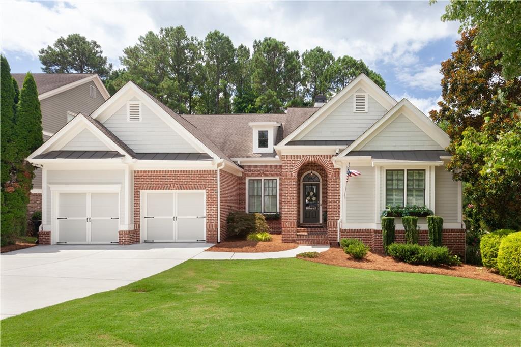 Looking for a Multi-Generational Home in the prestigious Bentwater Subdivision in the charming city of Acworth? This is it! This home offers so many options for large or extended families! Step inside to a well-maintained home with a top-of-the-line remodeled kitchen, a truly a culinary masterpiece with custom cabinetry, high end appliances, designer countertops and loads of storage. In the designer kitchen you will find a bar area that holds a wine cooler and as well as a separate cold drink cooler. The kitchen is huge and has a spacious sitting area with large glass windows so you can have your coffee and watch the birds in the private wooded backyard. Off the kitchen you will find a beautiful dining room, laundry room with cabinetry as well as the half bath. Finishing out the Main level you will find the family room, complete with newly installed gas logs for fireplace and interior window shutters, Master Ensuite with separate Tub and shower, 2 more bedrooms and a full bath! Upstairs you will find a teen suite complete with a bedroom and full bath, not to mention a huge walk-in attic storage! Downstairs is a complete apartment! 2 bedrooms, with option for a 3 bedroom, newly completed full bath as well as full kitchen with new upper cabinets, built in oven and microwave, large family room with built in's, office or workout room, and newly installed laundry area! Room for extended families in this house! Loads of more unfinished storage space to complete to your desires! Looking to the Exterior you will find a manicured lawn with sprinkler system, as well as a screened porch and deck off back of house with brick patio underneath. Bentwater Community offers the perfect family lifestyle, with the fabulous golf course, with private dining, 5 pools (1 of which is just 5 doors down!) tennis courts and pickleball, hiking trail and playgrounds! Just minutes from Lake Allatoona, the huge Lakepoint Sports Facilities and downtown Acworth with all the wonderful dining options! This home has been meticulously updated and maintained, offering a perfect example of luxury, comfort and function! Schedule a showing before it's gone!