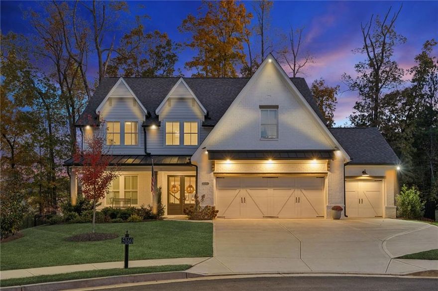 5160 Reserve Dr is the kind of home that instantly impresses—modern, light-filled, and thoughtfully designed for everyday living. Perfectly positioned , North facing home on a  cul-de-sac lot with a private fenced backyard that provides gated access to Midway Park, this newer construction, customized home delivers space, style, and functionality in one of Cumming’s most desirable areas. 

The main floor features a welcoming open layout anchored by a stunning chef’s kitchen. Here, quartz countertops gleam beneath under-cabinet lighting, while crisp white cabinetry extending to the ceiling, a classic herringbone backsplash, stainless steel appliances and hardwood floors create a timeless aesthetic. Culinary enthusiasts will appreciate the chef style oven, gas cooktop with built-in vent hood, and a farmhouse sink that blends charm with practicality. Adjacent to the kitchen, the living area showcases custom built-ins and a shiplap-accented fireplace that serve as a beautiful focal point.

A secondary bedroom and full bath on the main floor make this layout ideal for guests or multigenerational living, and a convenient half bath ensures family and visitors have their own dedicated space without sharing a full bath.

Upstairs, you’ll find four spacious bedrooms and three full baths, including an expansive primary suite that feels like a private retreat. The en-suite bath is a showstopper, featuring floor-to-ceiling tile in the walk-in shower, a stand-alone soaking tub, and quartz countertops that elevate the spa-like experience. An additional finished room off the primary suite provides flexibility for an office, nursery, sitting area, or private retreat. Neat freaks will love the laundry room with a connection to the primary suite!

Throughout the home, thoughtful upgrades continue—gleaming hardwoods, custom trim, and energy-efficient design details. A three-car garage offers overhead storage racks and an EV charger for modern convenience.

Located minutes from Big Creek Greenway, Midway Park, Cumming City Center, Halcyon, Lake Lanier, and area golf courses, this home offers quick access to GA-400, top schools, and everyday conveniences.

If you’re searching for a move-in-ready home with modern finishes, luxurious details, and exceptional livability, 5160 Reserve Dr in Cumming, Georgia, delivers it all—making it an ideal choice for buyers seeking upscale suburban living with timeless appeal.  Ask about our preferred lender's closing cost credit offered to qualified buyers. **** Interior photos and Video will be available Wednesday 11/12/2025