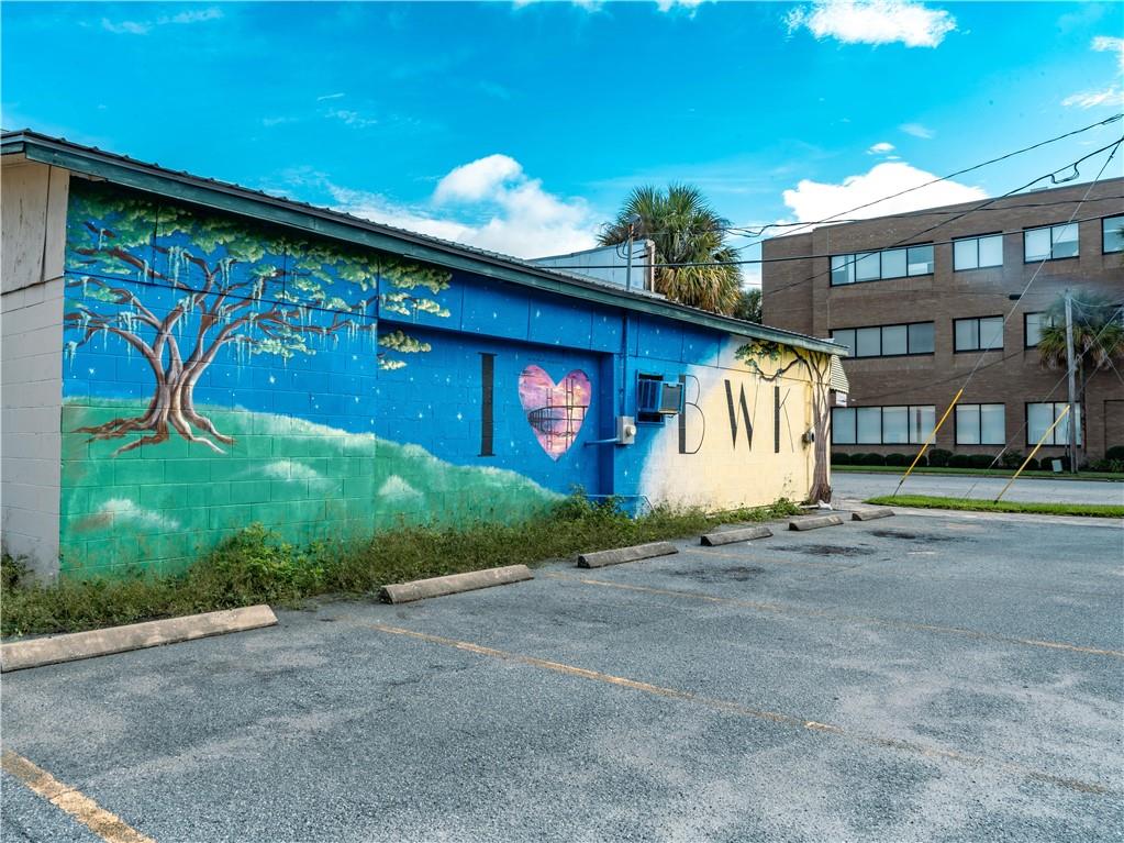 Prime commercial opportunity in the heart of Downtown Brunswick. This 510 SF corner property offers excellent visibility with strong traffic counts and is located within walking distance of City Hall, the Brunswick Courthouse, the Port Authority, Glynn County Tax Commission Office, and Mary Ross Waterfront Park.
Zoned General Commercial (Flexible Mixed Use), this property allows for multiple uses including short-term rental (STR), law office, retail, coffee shop, or professional services. The versatile zoning, paired with its downtown location, makes it an attractive option for both investors and owner-operators.
The building retains original character with vintage finishes and offers strong visibility, enhanced by the well-known local mural along its exterior. With below-market pricing, nearby redevelopment, and steady downtown activity, this property presents a value-add opportunity with significant upside potential.
Whether you envision an income-producing investment or a boutique business space, this property offers the flexibility, location, and charm to set you up for success in a thriving coastal market.