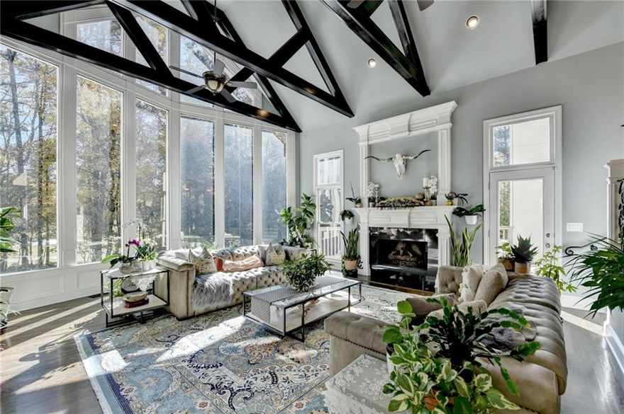 6000 Greatwood Terrace – Rare Luxury Estate in Windward Golf Community Take a Deep Breath...Your dream house is here! This stunning 6-bedroom, 6 full and 1 half-bathroom home offers 7,599 square ft. of exceptional living space in the highly sought-after Windward community, renowned for its top-rated schools and scenic golf course views. Every detail of this home exudes elegance, from the exquisite wood trims to the thoughtfully designed layouts. Step inside to a grand two-story foyer that opens into a double-height great room. Sunlight pours through floor-to-ceiling windows, filling the home with natural light. To the right is a classic study with rich wood trim, while to the left, a formal dining room accommodates 12 guests, perfect for entertaining. The heart of the home is a chef’s dream kitchen, featuring high-end appliances, an oversized island, a walk-in pantry, and a wet bar. Adjacent is a second great room—a true showstopper—with 8 large windows, elegant railing details, and farmhouse-style beams, offering spectacular views of the outdoor pool and golf course. Upstairs, two Jack & Jill bedrooms share a bathroom, with an additional bedroom featuring a private bath. The luxurious primary suite includes a spa-like bath, dual vanities, and a walk-in closet, creating a private retreat. The fully finished basement is an entertainer’s paradise, complete with a wet bar, fitness room, billiards and ping pong areas, plus a newly added full guest suite, perfect for family or visitors. Why You’ll Love This Home: Rare layout: double great rooms, double-height ceilings, and 8 large windows. Outdoor lifestyle: private pool with golf course views. Exceptional entertaining space: 6 bedrooms, 6 full & 1 half baths. Elegant details throughout: custom wood trims, railing accents, and designer finishes. This is more than a home—it’s a lifestyle upgrade in one of the most prestigious Windward neighborhoods. Don’t miss this rare opportunity!