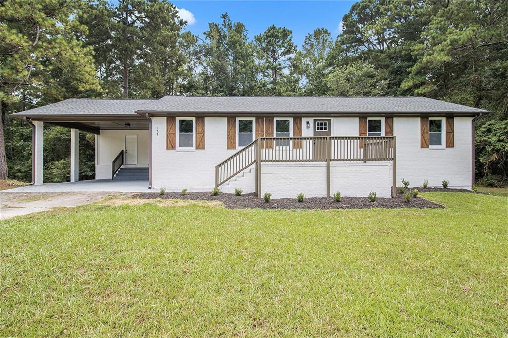 Welcome to this updated ranch on a full basement! This lovely 3-bedroom, 2-bathroom home features a brand-new kitchen and stainless steel appliances. The bathrooms have been completely updated with new showers, primary bathroom shower and soaker tub, vanities, and sleek black hardware. The home also boasts new, bright flooring throughout. Large backyard features a brand new deck, set the stage for relaxing evenings or weekend entertaining. Conveniently located just a short 10-minute drive from Interstate 85 and all the shopping, dining, and entertainment options on Main St. Senoia, this home offers both convenience and potential. Don't miss out on this fantastic opportunity!