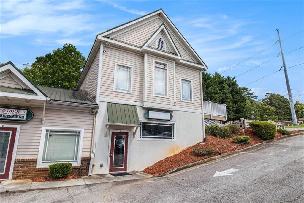 Position your business for success in this flexible and professionally maintained suite located in a prime location on Rockbridge Rd in Stone Mountain, ideal for a wide range of business uses. The open layout and private restroom provide a functional setup for medical or wellness practices, counseling services, co-working or creative studios, training or tutoring centers, or administrative and professional offices. Located in a high-visibility corridor with convenient access to I-285 and Hwy 78, this suite is part of a well-kept commercial building surrounded by other established businesses. The property offers plenty of on-site parking for staff and clients, exterior signage opportunities, and a professional setting designed to support growth and visibility. Whether you're launching, relocating, or expanding, this suite is a strategic choice for your next business move.