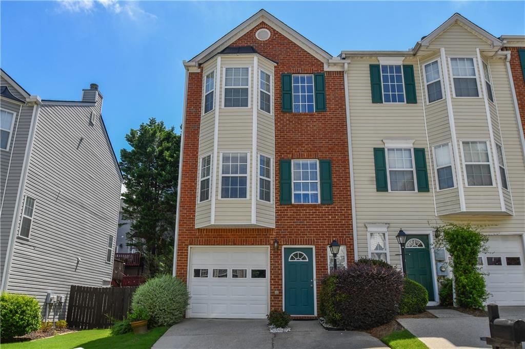 Welcome to this beautifully maintained 2-bedroom, 2.5-bath end-unit townhome located in a quiet and desirable community near downtown Cumming. This move-in ready home offers an attached garage plus extra parking, making everyday convenience a breeze. The kitchen features stained cabinets, a breakfast bar, and a spacious dining area—perfect for hosting or enjoying family meals. Relax in the large family room with a cozy gas fireplace, ideal for quiet evenings or entertaining guests. Upstairs, you’ll find two generously sized bedrooms in a great roommate-style layout, each with their own private bath and walk-in closets. Step outside to a large deck just off the kitchen, overlooking a private backyard—a perfect spot to unwind or enjoy your morning coffee.
This townhome is located in a well-kept community just minutes from schools, shopping, dining, and entertainment. With easy access to downtown Cumming, GA-400, parks, and more, this is an unbeatable location to call home!