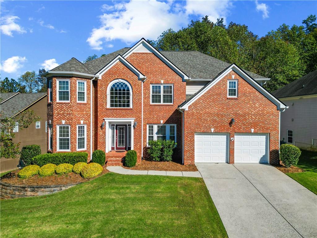 Mansion style home in beautiful south west Forsyth County! Step inside this stunning 8-bedroom, 5-bath home in one of Cumming’s premier swim and tennis communities—where nearly 5,500 square feet of beautifully finished space blends elegance, light, and livability. Gleaming hardwoods span the main level, complemented by brand-new double-pane windows throughout and a four-year-old roof. From its open layout to its thoughtful details, this home offers space and comfort rarely found at this level. The main floor centers around an impressive kitchen—an oversized island overlooks the great room and a wall of windows with views of the wooded backyard. A generous dining room, full guest suite with attached bath, and multiple living areas make entertaining effortless. Upstairs features five bedrooms including a stunning primary suite with dual walk-in closets, spa-inspired bath, and private laundry. The finished terrace level adds versatility with two bedrooms, a full bath, a large media or recreation room, and pre-wiring for a kitchenette—ideal for guests or an in-law suite. Out back, enjoy a large deck overlooking the landscaped, wooded yard. With an unbeatable location just minutes from GA-400, The Collection, and Cumming City Center, this home is zoned for Vickery Creek Middle and the coveted West Forsyth High School.
Spacious, bright, and beautifully maintained—this one checks every box.