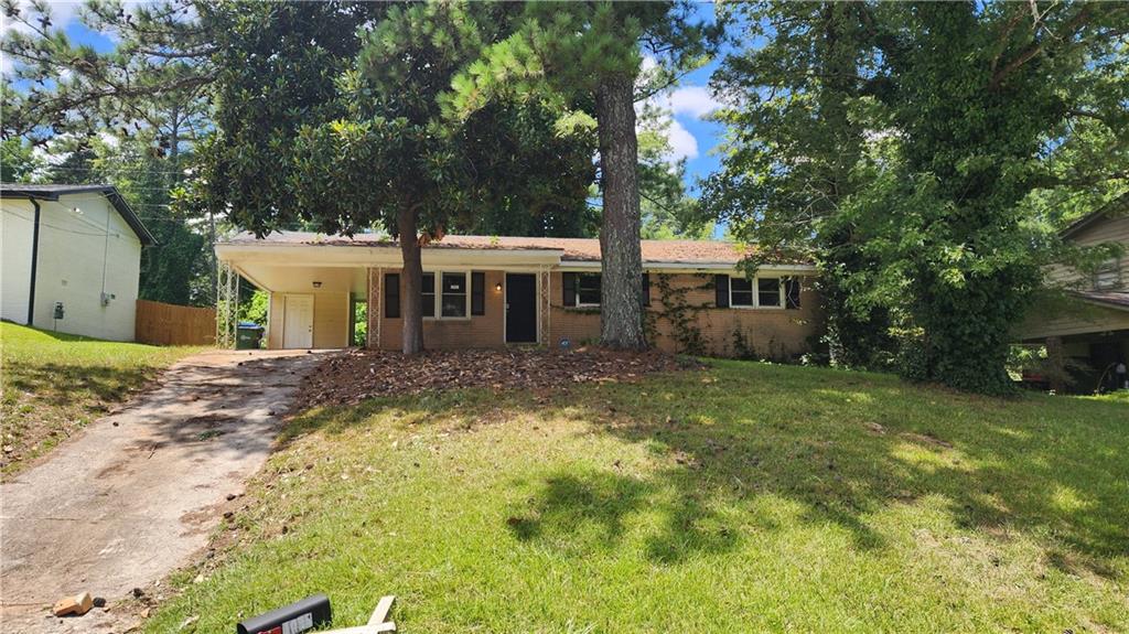Make a great deal even better with Massive savings through special loan programs with the Preferred Lender Envoy Mortgage with Aubrey Wilcox! Ask the Listing Team for the introduction for up to 100% Financing or even interest rates in the 4s!
Located in the quiet and established Forest Valley neighborhood, this 3-bedroom, 2-bath brick ranch is full of potential and ready for your vision. This home sits on a deep, private lot that offers space and privacy rarely found this close to the city. Inside, you'll find a spacious living area and a classic layout with great bones—perfect for updates and customization. The home sits on a crawl space. Positioned just minutes from Buckhead, Midtown, Emory, and the BeltLine, with quick access to I-85 and GA-400, this is an excellent opportunity for homeowners or investors looking to get into one of Atlanta’s most central locations.