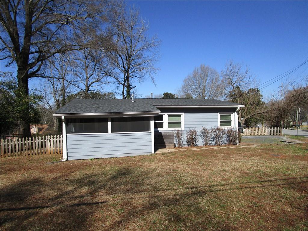 Fully renovated bungalow just blocks from the Marietta Square. SS appliances including 5 burner gas range. Gourmet kitchen has tons of storage & counter space featuring eat-at island, white cabinets with soft close drawers and doors, Walnut Butcher Block counters. Extra large, deep sink w/disposal. Vaulted ceilings & beautiful wide plank floors throughout, stackable washer/dryer (connections only). Bath features spacious, double vanity with huge storage cabinet, subway tile & soaking tub. Front porch is screened in and backyard is fenced in!