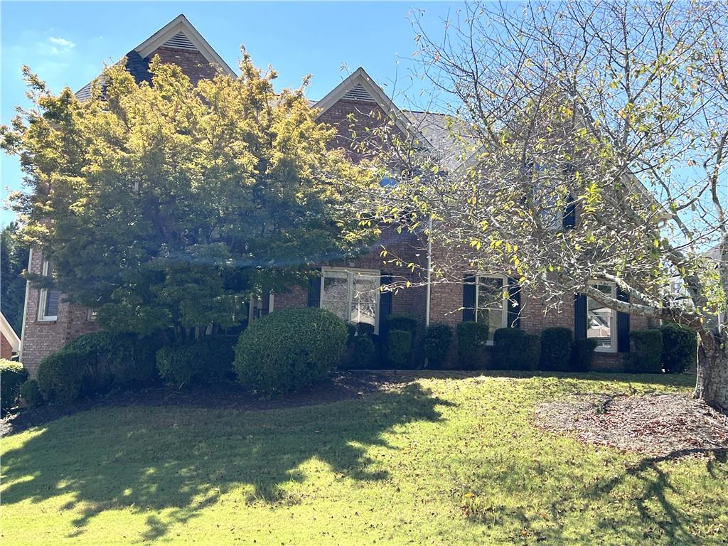 Welcome to this Swim/Tennis community for a beautiful three sided brick corner lot home in sought after Paces Ferry Park.Minutes from charming shops & restaurants in Vinings area & convenient to The Battery for sports & entertainment.Award winning Cobb County School District.This executive home has brand new interior paint,spacious rooms on main level ideal for entertaining family & guests.Enter the grand two story entrance with large dining room with wains coating on right & formal living room or office on left.Then enter into the family room with fireplace & tons of windows & light. Adjacent to family room is a bonus room that could easily be converted to 6th bedroom on main level OR ideal for office, library, piano room, playroom, etc. The kitchen offers granite counters,beautiful cabinetry & backsplash, large island, walk-in pantry, & breakfast room area. Separate laundry room off kitchen with cabinetry & wash sink.Leading from the breakfast room is a wonderful tiled sunroom with tons of windows & natural light.Sunroom leads to deck ideal for those summer BBQ's & entertaining family & friends.The spacious primary suite upstairs includes a sitting area & updated bath featuring double vanities, separate tub & shower. Three additional sizable bedrooms with walk-in closets upstairs as well as additional full bath.The finished lower level features an oversized room with wet bar ideal for entertaining,media room,& additional room for 5th bedroom,office,playroom, teen/in-law suite, or exercise room.Additional full bath on lower level. Also unfinished space with shelving & wash sink with separate door from other part of lower level.Strong community feel with several planned events throughout the year.The active swim team is perfect for children of all ages. This home has tremendous space and options for the buyer looking for space.Hurry & seize this opportunity, as homes rarely go on the market in this highly popular community convenient to it all.