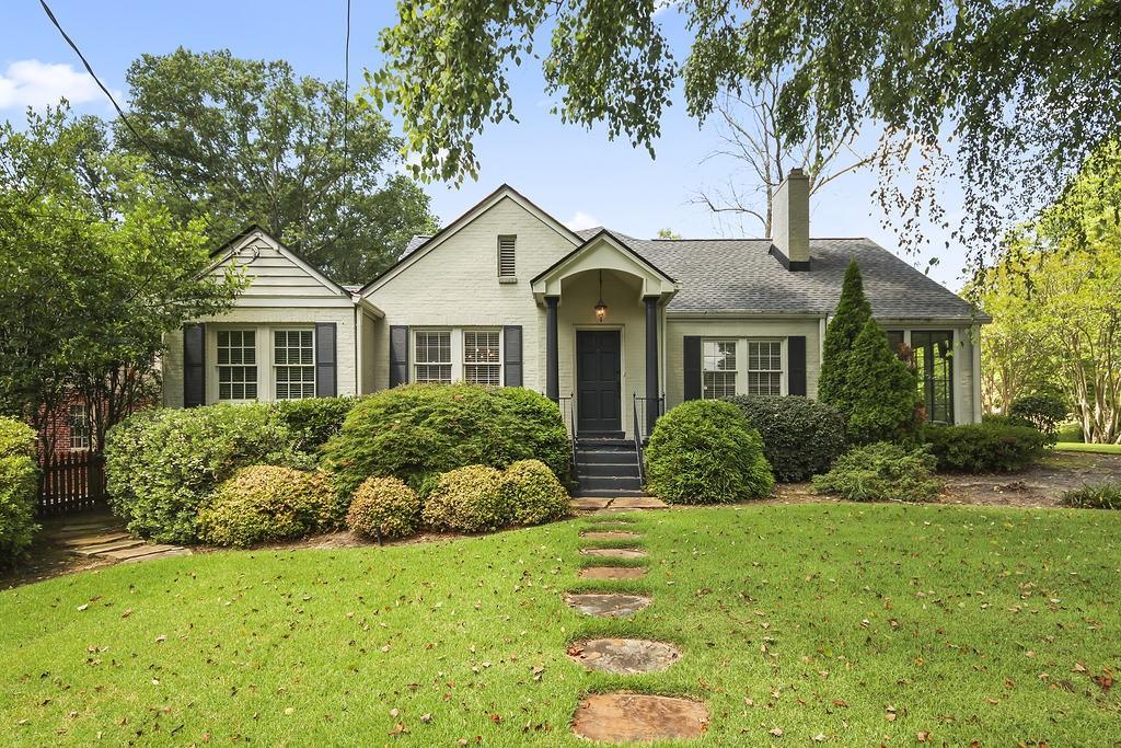 A beautiful leasing opportunity at 2880 Alpine Drive, an exceptional 3-bedroom, 3-bathroom brick home ideally situated in the heart of Atlanta's highly sought-after Peachtree Heights/Garden Hills neighborhood. Tucked away on a beautifully landscaped lot, this home offers timeless curb appeal with a welcoming front walkway, charming covered porch, and a classic painted brick exterior. Step inside to find light-filled living spaces, hardwood floors, and a thoughtfully updated interior that blends elegance with functionality. The gourmet kitchen features shaker cabinetry, stainless steel appliances, a center island with seating, and a walk-in pantry, opening into a spacious living room with a fireplace — ideal for both entertaining and everyday living. The generous upstairs primary suite is a true retreat, complete with vaulted ceilings, a large arched window, fireplace seating area, and a spa-inspired ensuite bath. Two additional bedrooms on the main floor are complemented by a beautifully finished bonus room and a bright sunroom that makes a perfect home office or play space. Outside, enjoy a private covered patio with ceiling fans and a large carport with additional storage. Located in the desirable Garden Hills Elementary and Sutton Middle school districts, and minutes from Atlanta International School (AIS), this home is perfect if you are seeking top-tier education options. Walk to nearby Buckhead Village District for some of Atlanta’s best dining, shopping, and local events, or enjoy weekends at Frankie Allen Park just around the corner. Don't miss this rare opportunity to rent a turnkey home in one of Atlanta’s most prestigious and walkable neighborhoods.