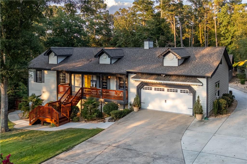 Welcome to 2390 Stone Drive! This renovated ranch offers 4 bedrooms and 2 full bathrooms, with an ADU consisting of 1 bedroom and 1 full bathroom. The primary suite is conveniently located on the main level with a carefully thought, showroom ready bathroom. The heart of the home features a beautiful kitchen island with a dining area to the side, all flowing seamlessly into the fireside living room. The open floor plan has been complemented by a full renovation in 2022 consisting of brand new LVP flooring, fresh paint, and stylish updates throughout, including new backsplash, appliances, roof, septic system, and countertops. A separate dining room, open porch, and bright living spaces make this home perfect for everyday living or entertaining. This house includes a walkout basement that provides even more space and flexibility. This property offers a unique opportunity to live in one unit and rent out the other - let the rental income help offset your mortgage and reduce your monthly expenses. Additional highlights include a flat driveway, automatic garage, and a prime location near Stone Mountain Park, Hwy. 78, and I-285. If you’re interested, don’t wait—schedule a showing today and see firsthand what this home has to offer!