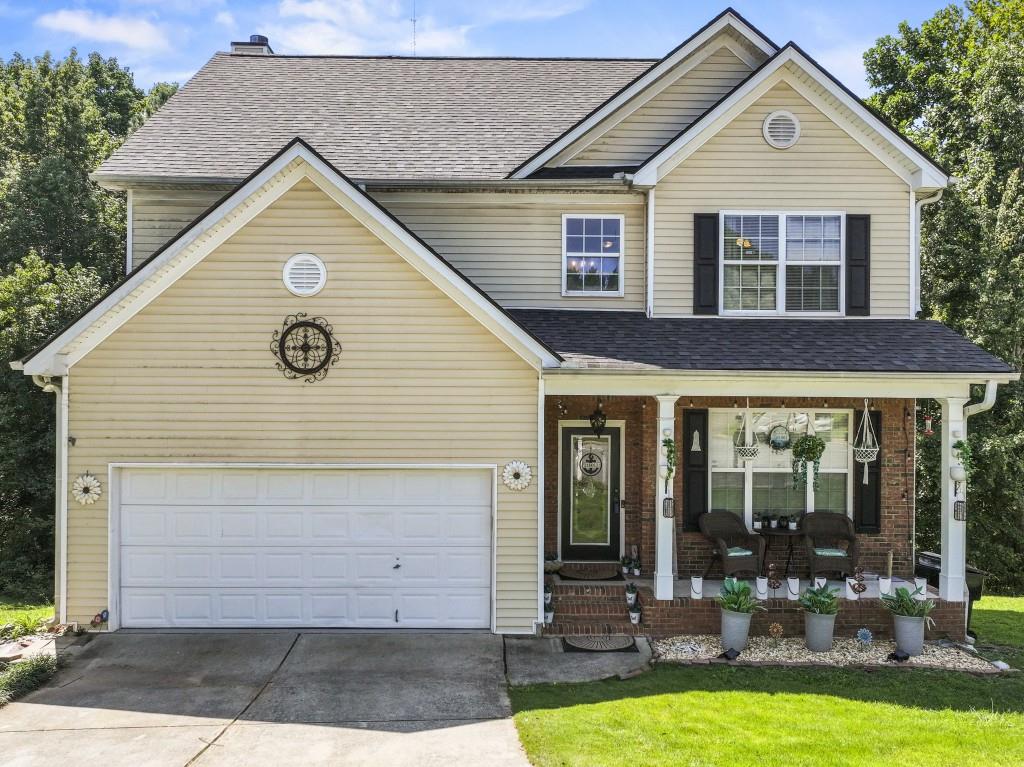 Come check out this great home in Burts Crossing! This adorable 5 bedroom, 2.5 bath home with a covered front porch features an open floor concept. The kitchen features gray cabinets and an extended kitchen island designed to serve as a dining table, providing ample space for meals. It has a full finished basement which can be an in-law suite, as it comes with a finished bath and kitchen. The roof and HVAC system were replaced in 2023. This is one of the larger floorplans in neighborhood.